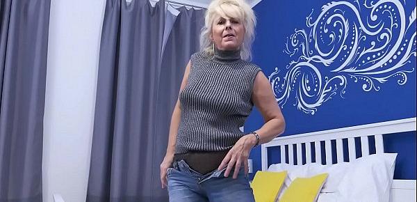  Euro gilf Koko lowers her jeans and rubs her pussy